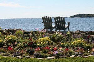 two adirondack chairs on Maine coast